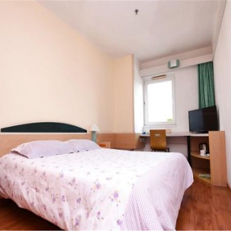 Motel Qingdao Jiaonan Renmin Road Business Street Extérieur photo