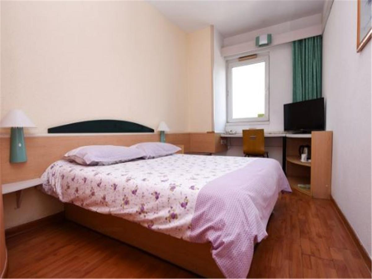 Motel Qingdao Jiaonan Renmin Road Business Street Extérieur photo